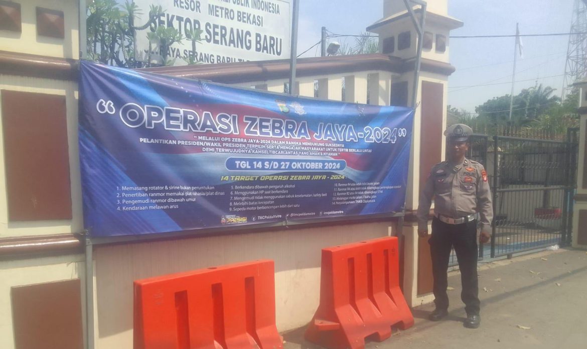 Sosialisasi Operasi Zebra Jaya 2024, Unit Lantas Polsek Serang Baru Pasang Spanduk di Jalan KH Ma’mun Nawawi